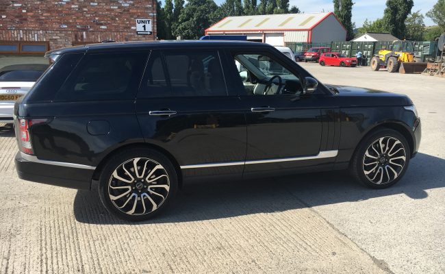 black-range-rover-dvd-screens